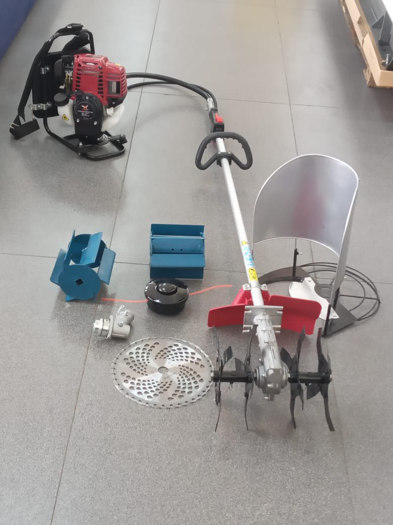 1000257138.jpg Petrol powered weeder tiller with a rice harvester - Image 1